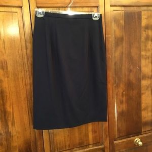 Laurel skirt, no size tag, virgin wool, lined, front quarter pleats